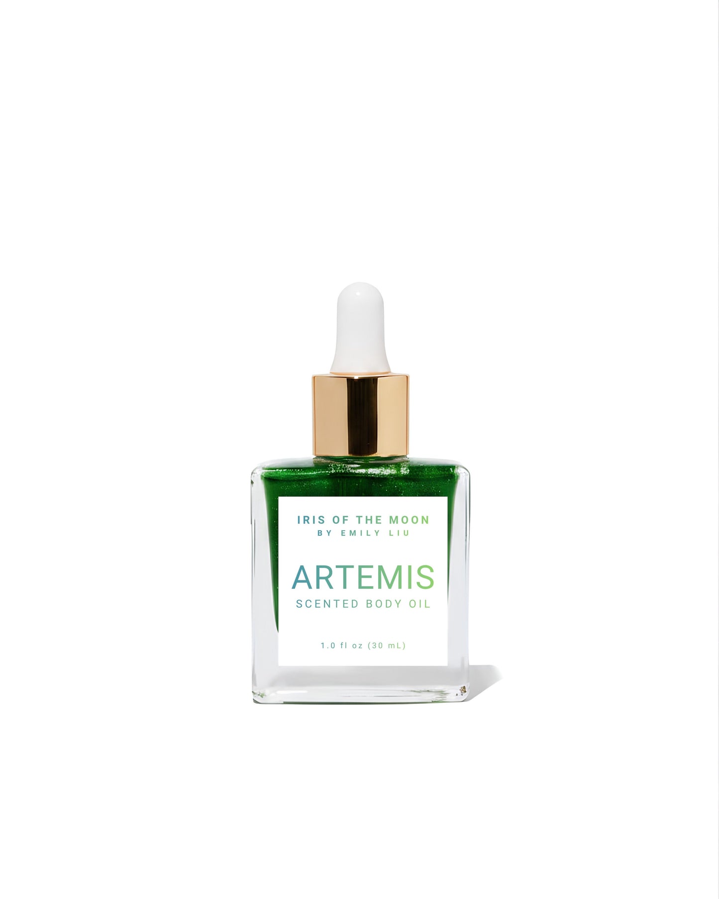 A clear glass dropper bottle of Artemis Scented Body Oil by Iris of the Moon. The bottle is filled with green liquid and features a white label with green and blue text, topped with a gold collar and white dropper cap, set against a plain white background.