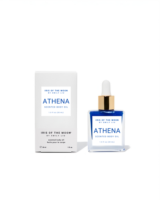 Athena scented body oil with packaging on a white background