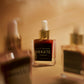 Hekate perfume bottle with smoke effect on a blurred background
